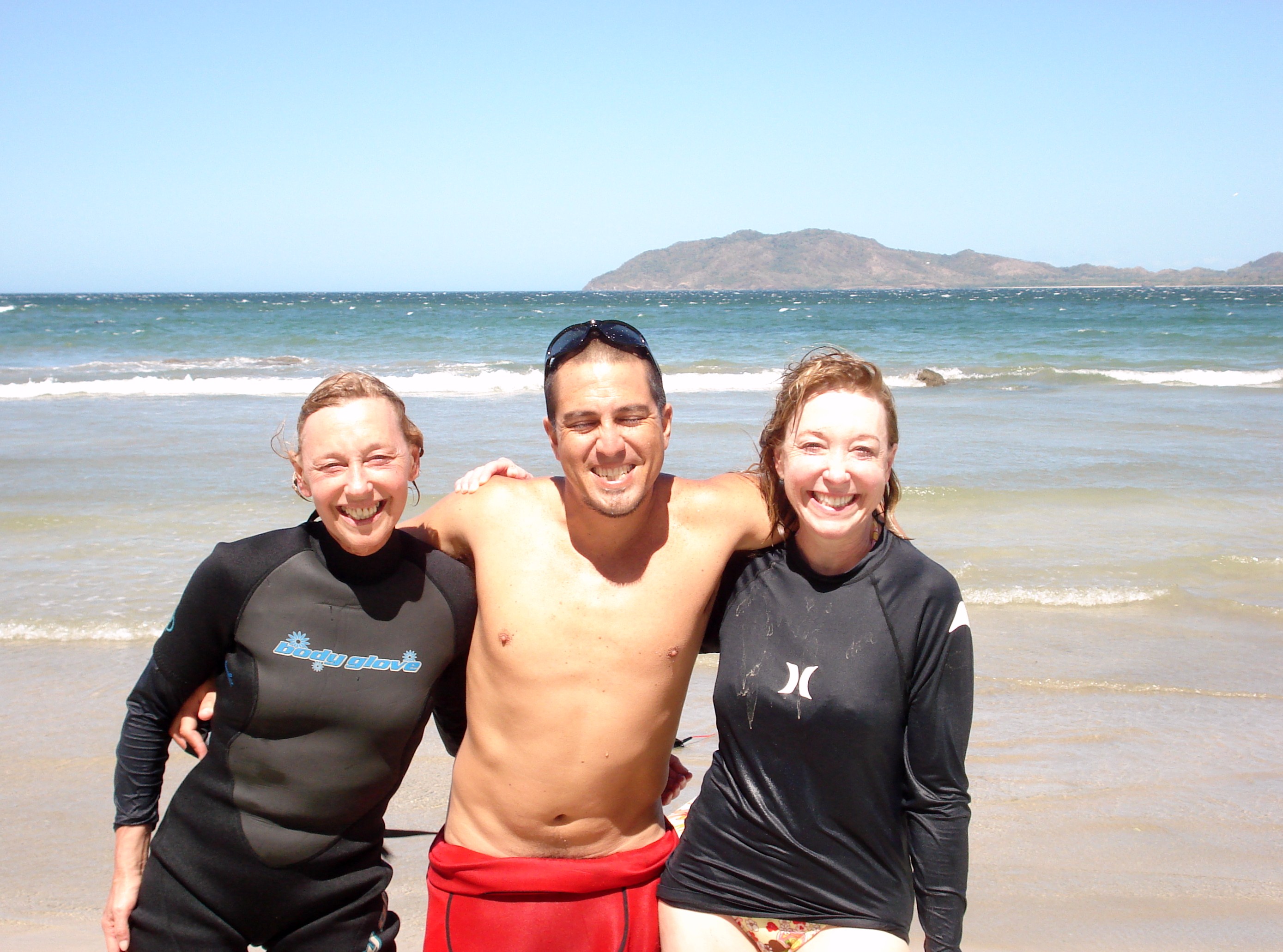 Chiropractor and attorney surfing in Costa Rica